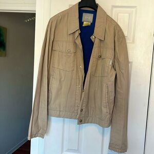 Dapper Versace wind breaker jacket, stunning with minor rips that can be sown.